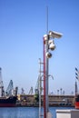 Security cctv cameras at street on pylon in blue background. Royalty Free Stock Photo