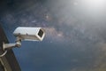 Security cctv surveillance camera in front of blue sky with copy Royalty Free Stock Photo