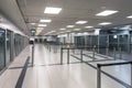 security checkpoint, with security officers and metal detectors, in empty airport terminal