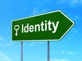 Security concept: Identity and Key on road sign