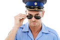 Security, crime and portrait of police with sunglasses on white background for authority, public safety and laws Royalty Free Stock Photo