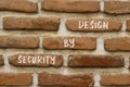 Security by design symbol. Concept words Security by design on red bricks on a beautiful brick wall background. Business finacial Royalty Free Stock Photo