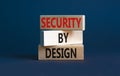 Security by design symbol. Concept words Security by design on wooden blocks on a beautiful grey table grey background. Business Royalty Free Stock Photo