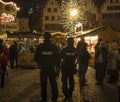 Security in German Christmas market in Frankfurt am Main, Germany.