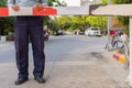 Security guard with barrier gate