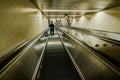 Security guard on escalator at train station Royalty Free Stock Photo