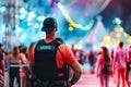 Security Guard Ensuring Safety At A Lively Festival Event