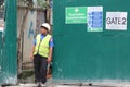 Security guard at the entrance of a construction site Royalty Free Stock Photo