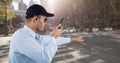 Security guard holding walkie talkie while pointing on road Royalty Free Stock Photo