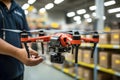 A security guard launches a security camera drone into a large warehouse