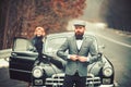 Security guard of luxury woman. securoti guard man and girl in retro car. Royalty Free Stock Photo