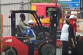 Security guard in the midst of construction workers