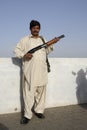 Pakistani man with shotgun