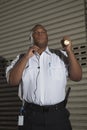 Security Guard Patrols At Night Royalty Free Stock Photo