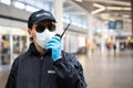 Security Guard Standing In Face Mask