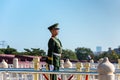Security guard standing in front of the Tiananmen Gate, at the entrance of the Forbidden City in Beijing, China Royalty Free Stock Photo