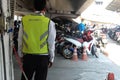 Security guard surveillance at motorcycle parking of building