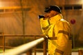 Security Guard Walking Building Perimeter With Flashlight Royalty Free Stock Photo