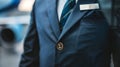 Security guard wearing suit standing in lobby of building