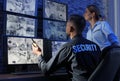 Security guards monitoring modern CCTV cameras Royalty Free Stock Photo