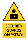 Security guards on patrol, warning yellow triangle sign with text