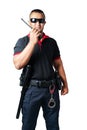 Security guards wear dark glasses. stand holding a radio There are rubber batons and handcuffs on the tactical belt. on isolated