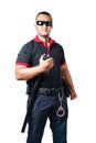 Security guards wear dark glasses. stand holding a radio There are rubber batons and handcuffs on the tactical belt. on isolated