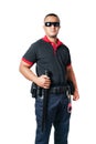 Security guards wear dark glasses. Stand holding a rubber baton and handcuffs on the tactical belt. on isolated white background