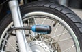 Security lock blocking the motorcycle front wheel