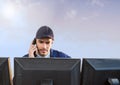 Security man on bright background computers with cloudy sky