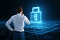 Security network technology and business people protect personal information concept with businessman back view looking at digital Royalty Free Stock Photo