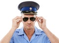 Security, officer and face of police with sunglasses on white background for authority, public safety and crime. Justice Royalty Free Stock Photo