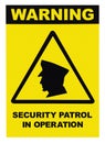 Security patrol in operation text warning sign label, isolated, large detailed vertical closeup Royalty Free Stock Photo