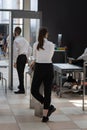 Security personnel checking bags and backpacks x-rayed at the access gate