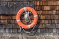 Security, red life buoy hanging on the wall Royalty Free Stock Photo