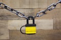 Security Series Chained Yellow Padlock Wooden Background