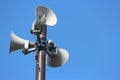 security speakers tower for warning or announce with clear blue sky background.