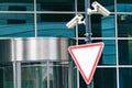 Security surveillance system at the entrance to a modern office building. Two cameras of video surveillance. Royalty Free Stock Photo