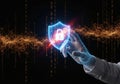 Security Technology Hand Holding a Glowing Digital Shield with a Padlock Icon Symbolizing Data Protection in a Cyber Network with Royalty Free Stock Photo