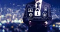 Security theme with businessman holding a tablet Royalty Free Stock Photo