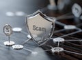 Security warning: text Scam highlighting dangers of fraud, online deception, phishing, cyber threats, emphasizing Royalty Free Stock Photo