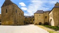 Tourist in court of Chateau de Sedan in summer