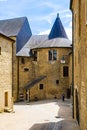 Visitor in court of Chateau de Sedan in summer