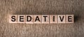 SEDATIVE word written on wooden blocks on a brown background