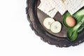 Seder dinner composition. Matzo bread, egg, apple fruit and chazeret lettuce vegetable on vintage silver tray. Happy Royalty Free Stock Photo