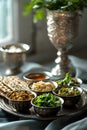 Seder dinner table with decorations, wine and food. Traditional Jewish kosher meals