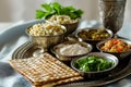 Seder dinner table with decorations, wine and food. Traditional Jewish kosher meals