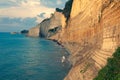 Sedimentary Rock Cliff at the sea, Limestone Natural Structure Coast, Mointain Chain of Layered Stone Formation along the Beach, H Royalty Free Stock Photo
