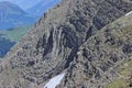 Sedimentary rock folded into syncline in alpine swiss mountains. Royalty Free Stock Photo