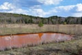 Sedimentation basin on old copper mining site.